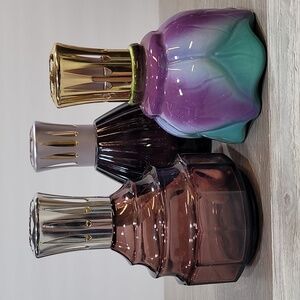 Three, Lampe Berger of Paris, oil lamps.